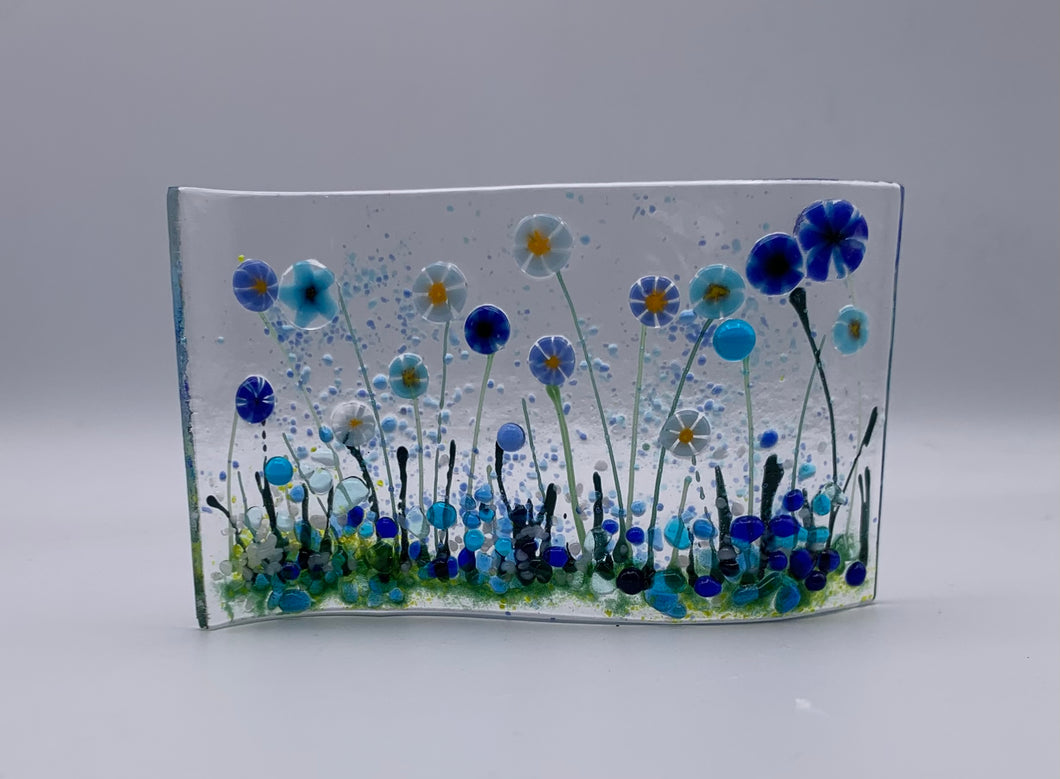 Small blue meadow flower wave