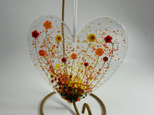 Load image into Gallery viewer, Hanging heart with red, yellow and orange flowers
